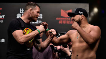 SHANGHAI, CHINA - NOVEMBER 24: (L-R) Michael Bisping of England and Kelvin Gastelum face off during the UFC Fight Night weigh-in on November 24, 2017 in Shanghai, China. (Photo by Brandon Magnus/Zuffa LLC via Getty Images)