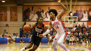 LAHAINA, HI - NOVEMBER 23: Lamar Washington #1 of the Texas Tech Red Raiders drives to the basket as he is guarded by Justice Sueing #14 of the Ohio State Buckeyes in the first half of the game during the Maui Invitational at Lahaina Civic Center on November 23, 2022 in Lahaina, Hawaii. (Photo by Darryl Oumi/Getty Images)