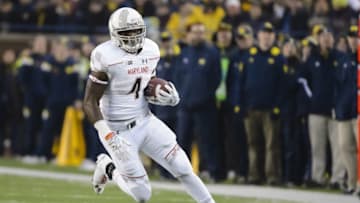 Nov 22, 2014; Ann Arbor, MI, USA; Maryland Terrapins running back Wes Brown (4) rushes in the second quarter against the Michigan Wolverines at Michigan Stadium. Mandatory Credit: Rick Osentoski-USA TODAY Sports