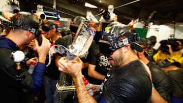 CHICAGO, IL - OCTOBER 19: The Los Angeles Dodgers celebrate in the clubhouse after defeating the Chicago Cubs 11-1 in game five of the National League Championship Series at Wrigley Field on October 19, 2017 in Chicago, Illinois. The Dodgers advance to the 2017 World Series. (Photo by Jamie Squire/Getty Images)