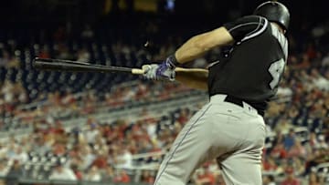 Aug 26, 2016; Washington, DC, USA; Colorado Rockies catcher Nick Hundley (4) has a three run home run in the ninth inning off Washington Nationals relief pitcher Shawn Kelley (not pictured) at Nationals Park. Washington Nationals defeated Colorado Rockies 8-5. Mandatory Credit: Tommy Gilligan-USA TODAY Sports
