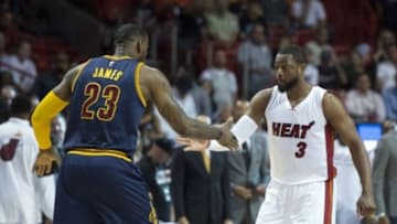 Mar 16, 2015; Miami, FL, USA; Cleveland Cavaliers forward LeBron James (23) and Miami Heat guard Dwyane Wade (3) shake hands before the start of the game at American Airlines Arena. Mandatory Credit: Tommy Gilligan-USA TODAY Sports