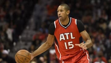 Jan 19, 2015; Atlanta, GA, USA; Atlanta Hawks center Al Horford (15) dribbles the ball against the Detroit Pistons during the second half at Philips Arena. The Hawks won 93-82. Mandatory Credit: Dale Zanine-USA TODAY Sports