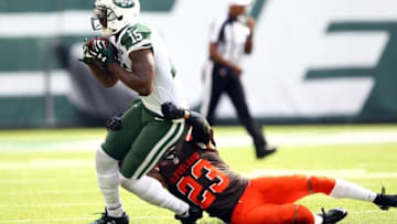 Sep 13, 2015; East Rutherford, NJ, USA; New York Jets wide receiver Brandon Marshall (15) is tackled by Cleveland Browns cornerback Joe Haden (23) during the second half at MetLife Stadium. Mandatory Credit: Danny Wild-USA TODAY Sports