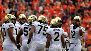 CLEMSON, SOUTH CAROLINA - NOVEMBER 16: Jamie Newman #12 of the Wake Forest Demon Deacons during their game at Memorial Stadium on November 16, 2019 in Clemson, South Carolina. (Photo by Streeter Lecka/Getty Images)