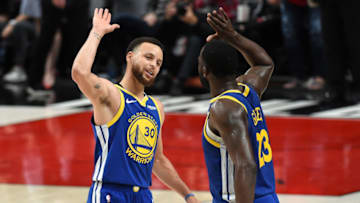 PORTLAND, OREGON - MAY 18: Stephen Curry #30 of the Golden State Warriors celebrates with Draymond Green #23 during the second half against the Portland Trail Blazers in game three of the NBA Western Conference Finals at Moda Center on May 18, 2019 in Portland, Oregon. NOTE TO USER: User expressly acknowledges and agrees that, by downloading and or using this photograph, User is consenting to the terms and conditions of the Getty Images License Agreement. (Photo by Steve Dykes/Getty Images)