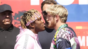LOS ANGELES, CALIFORNIA - SEPTEMBER 14: Olajide William Olatunji aka KSI (L) and Logan Paul onstage at the KSI VS. Logan Paul 2 - launch press conference held at Gilbert Lindsey Plaza on September 14, 2019 in Los Angeles, California. (Photo by Michael Tran/Getty Images)