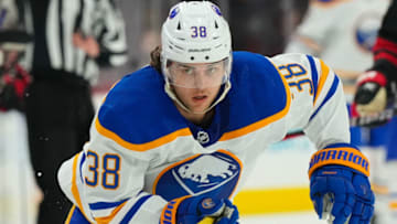 Nov 4, 2022; Raleigh, North Carolina, USA; Buffalo Sabres defenseman Kale Clague (38) skates against the Carolina Hurricanes during the third period at PNC Arena. Mandatory Credit: James Guillory-USA TODAY Sports