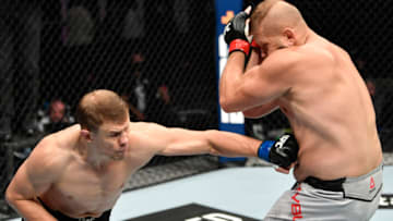 ABU DHABI, UNITED ARAB EMIRATES - JULY 12: (L-R) Maxim Grishin of Russia punches Marcin Tybura of Poland in their heavyweight fight during the UFC 251 event at Flash Forum on UFC Fight Island on July 12, 2020 on Yas Island, Abu Dhabi, United Arab Emirates. (Photo by Jeff Bottari/Zuffa LLC)