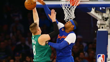 Dec 25, 2016; New York, NY, USA; New York Knicks forward Carmelo Anthony (7) blocks a shot by by Boston Celtics forward Jonas Jerebko (8) during the first half at Madison Square Garden. Mandatory Credit: Andy Marlin-USA TODAY Sports