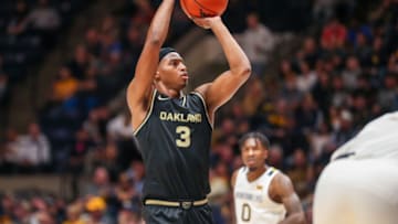 Nov 9, 2021; Morgantown, West Virginia, USA; Oakland Golden Grizzlies forward Micah Parrish (3) shoots a free throw during the second half against the West Virginia Mountaineers at WVU Coliseum. Mandatory Credit: Ben Queen-USA TODAY Sports
