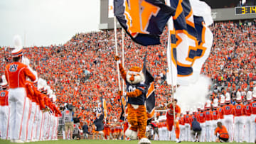 AUBURN, AL - SEPTEMBER 28: The Auburn Tigers cheerleaders run out on to the field prior to their game against the Mississippi State Bulldogs at Jordan-Hare Stadium on September 28, 2019 in Auburn, AL. (Photo by Michael Chang/Getty Images)