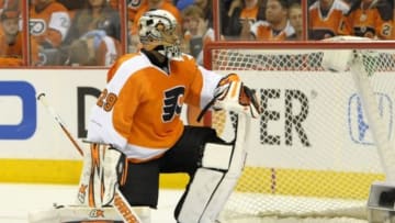 Apr 22, 2014; Philadelphia, PA, USA; Philadelphia Flyers goalie Ray Emery (29) reacts after allowing a goal by New York Rangers right wing Martin St. Louis (not pictured) during the first period in game three of the first round of the 2014 Stanley Cup Playoffs at Wells Fargo Center. Mandatory Credit: Eric Hartline-USA TODAY Sports