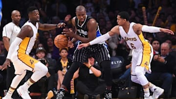 Jan 8, 2017; Los Angeles, CA, USA; Los Angeles Lakers guard Jordan Clarkson (6) and Los Angeles Lakers forward Julius Randle (30) pressure Orlando Magic forward Serge Ibaka (7) in the second half of the game at Staples Center. Lakers won 112-95. Mandatory Credit: Jayne Kamin-Oncea-USA TODAY Sports