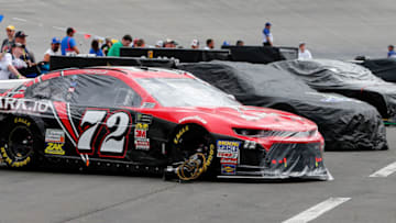 BRISTOL, TN - AUGUST 18: The car of Corey LaJoie, driver of the #72 ARK io Blockchain Solutions Chevrolet, sits on pit road prior to the start of the Monster Energy NASCAR Cup Series Bass Pro Shops NRA Night Race at Bristol Motor Speedway on August 18, 2018 in Bristol, Tennessee. (Photo by Brian Lawdermilk/Getty Images)