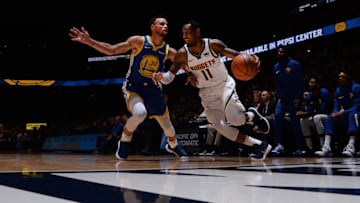 DENVER, CO - OCTOBER 21: Monte Morris #11 of the Denver Nuggets handles the ball against the Golden State Warriors on October 21, 2018 at the Pepsi Center in Denver, Colorado. NOTE TO USER: User expressly acknowledges and agrees that, by downloading and/or using this photograph, user is consenting to the terms and conditions of the Getty Images License Agreement. Mandatory Copyright Notice: Copyright 2018 NBAE (Photo by Bart Young/NBAE via Getty Images)
