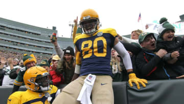 GREEN BAY, WI - SEPTEMBER 30: Jimmy Graham #80 of the Green Bay Packers celebrates with fans after scoring a touchdown during the first quarter of a game against the Buffalo Bills at Lambeau Field on September 30, 2018 in Green Bay, Wisconsin. (Photo by Dylan Buell/Getty Images)