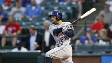 Sep 24, 2014; Arlington, TX, USA; Houston Astros second baseman Jose Altuve (27) hits a single during the first inning against the Texas Rangers at Globe Life Park in Arlington. Mandatory Credit: Kevin Jairaj-USA TODAY Sports