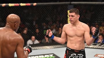 LAS VEGAS, NV - JANUARY 31: (R-L) Nick Diaz taunts Anderson Silva of Brazil in their middleweight bout during the UFC 183 event at the MGM Grand Garden Arena on January 31, 2015 in Las Vegas, Nevada. (Photo by Josh Hedges/Zuffa LLC/Zuffa LLC via Getty Images)