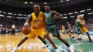 Dec 5, 2014; Boston, MA, USA; Los Angeles Lakers guard Kobe Bryant (24) drives to the hoop against Boston Celtics forward Jeff Green (8) during the first half at TD Garden. Mandatory Credit: Mark L. Baer-USA TODAY Sports
