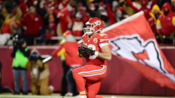 Nov 30, 2014; Kansas City, MO, USA; Kansas City Chiefs tight end Travis Kelce (87) celebrates his touchdown reception in the endzone in the second quarter against the Denver Broncos at Arrowhead Stadium. Mandatory Credit: Ron Chenoy-USA TODAY Sports