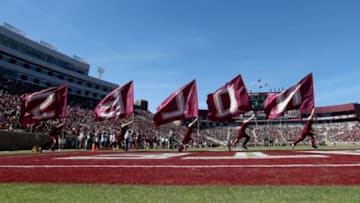 Oct 17, 2015; Tallahassee, FL, USA; Seminole cheerleaders celebrate a score as the Florida State Seminoles beat the Louisville Cardinals 41-21 at Doak Campbell Stadium. Mandatory Credit: Glenn Beil-USA TODAY Sports