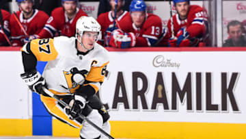 MONTREAL, QC - OCTOBER 13: Sidney Crosby #87 of the Pittsburgh Penguins skates the puck on a breakaway in a shootout against the Montreal Canadiens during the NHL game at the Bell Centre on October 13, 2018 in Montreal, Quebec, Canada. The Montreal Canadiens defeated the Pittsburgh Penguins 4-3 in a shootout. (Photo by Minas Panagiotakis/Getty Images)