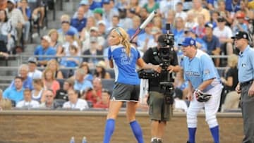 July 8, 2012; Kansas City, MO, USA; USA Softball pitcher Jenny Finch at bat during the 2012 Legends and Celebrity softball game at Kauffman Stadium. Mandatory Credit: Denny Medley-USA TODAY Sports