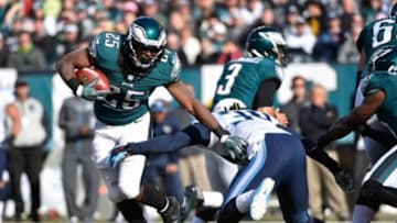 Nov 23, 2014; Philadelphia, PA, USA; Philadelphia Eagles running back LeSean McCoy (25) gets past Tennessee Titans strong safety Daimion Stafford (39) at Lincoln Financial Field. Mandatory Credit: Derik Hamilton-USA TODAY Sports