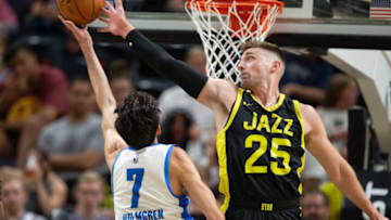 SALT LAKE CITY, UT - JULY 3: Chet Holmgren #7 of the Oklahoma City Thunder has a shot blocked by Micah Potter #25 of the Utah Jazz during the first half of their NBA Summer League game July 3, 2023 at the Delta Center in Salt Lake City, Utah. NOTE TO USER: User expressly acknowledges and agrees that, by downloading and/or using this Photograph, user is consenting to the terms and conditions of the Getty Images License Agreement.(Photo by Chris Gardner/Getty Images)