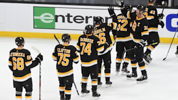 BOSTON, MA - NOVEMBER 29: The Boston Bruins celebrate the overtime win against the New York Rangers at the TD Garden on November 29, 2019 in Boston, Massachusetts. (Photo by Steve Babineau/NHLI via Getty Images)