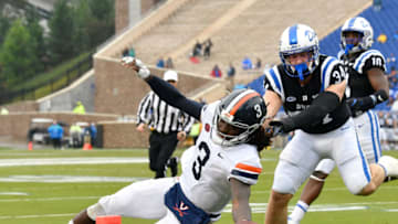 DURHAM, NC - OCTOBER 20: Bryce Perkins #3 of the Virginia Cavaliers beats Ben Humphreys #34 of the Duke Blue Devils to the pylon for a touchdown in the first half during their game at Wallace Wade Stadium on October 20, 2018 in Durham, North Carolina. (Photo by Grant Halverson/Getty Images)