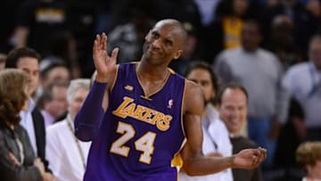 March 25, 2013; Oakland, CA, USA; Los Angeles Lakers shooting guard Kobe Bryant (24) reacts during the fourth quarter against the Golden State Warriors at Oracle Arena. The Warriors defeated the Lakers 109-103. Mandatory Credit: Kyle Terada-USA TODAY Sports