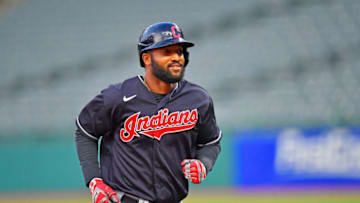 CLEVELAND, OHIO - JULY 14: Domingo Santana #24 of the Cleveland Indians rounds the bases after hitting a grand slam in the fifth inning of an intrasquad game during summer workouts at Progressive Field on July 14, 2020 in Cleveland, Ohio. (Photo by Jason Miller/Getty Images)