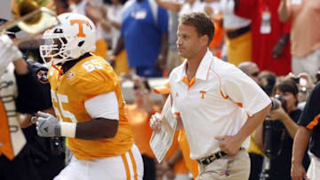 KNOXVILLE, TN - SEPTEMBER 12: Lane Kiffin, head coach of the Tennessee Volunteers takes the field against the UCLA Bruins on September 12, 2009 at Neyland Stadium in Knoxville, Tennessee. UCLA beat Tennessee 19-15. (Photo by Joe Murphy/Getty Images)