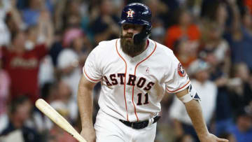 HOUSTON, TX - MAY 13: Evan Gattis #11 of the Houston Astros (Photo by Bob Levey/Getty Images)