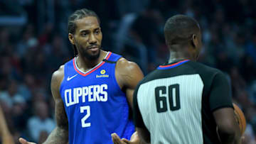 LOS ANGELES, CA - JANUARY 04: Kawhi Leonard #2 of the Los Angeles Clippers talks with referee James Williams #60 after a foul call in the first half of the game against the Memphis Grizzlies at Staples Center on January 4, 2020 in Los Angeles, California. NOTE TO USER: User expressly acknowledges and agrees that, by downloading and/or using this Photograph, user is consenting to the terms and conditions of the Getty Images License Agreement. (Photo by Jayne Kamin-Oncea/Getty Images)