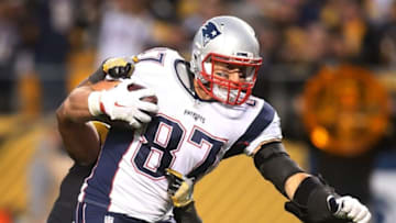Oct 23, 2016; Pittsburgh, PA, USA; New England Patriots tight end Rob Gronkowski (87) scores a touchdown past Pittsburgh Steelers strong safety Robert Golden (rear) during the third quarter at Heinz Field. New England won 27-16. Mandatory Credit: Charles LeClaire-USA TODAY Sports