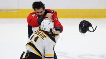 Feb 1, 2021; Washington, District of Columbia, USA; Washington Capitals right wing Tom Wilson (43) fights Boston Bruins center Trent Frederic (11) in the third period at Capital One Arena. Mandatory Credit: Geoff Burke-USA TODAY Sports