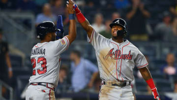NEW YORK, NY - JULY 02: Ronald Acuna Jr. #13 of the Atlanta Braves celebrate with Danny Santana #23 after hitting a 2-run game winning home run in the top of the eleventh inning against the New York Yankeesat Yankee Stadium on July 2, 2018 in the Bronx borough of New York City. Atlanta Braves defated the New York Yankees 5-3. (Photo by Mike Stobe/Getty Images)