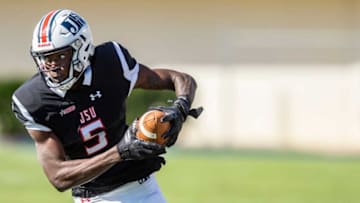 Auburn footballJackson State University's Shane Hooks (5) runs past a Texas Southern University defender during their game at Mississippi Veterans Memorial Stadium in Jackson, Miss., Saturday, Nov. 6, 2021.Tcl Jsu Vs Texas Southern6