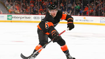 PHILADELPHIA, PA - FEBRUARY 28: Philippe Myers #5 of the Philadelphia Flyers passes the puck against the New York Rangers at the Wells Fargo Center on February 28, 2020 in Philadelphia, Pennsylvania. (Photo by Mitchell Leff/Getty Images)