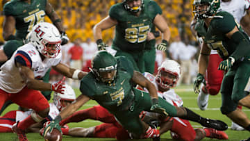 WACO, TX - SEPTEMBER 2: John Lovett #7 of the Baylor Bears rushes for a 3 yard touchdown against the Liberty Flames during the second half at McLane Stadium on September 2, 2017 in Waco, Texas. (Photo by Cooper Neill/Getty Images)