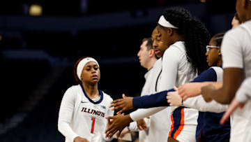 MINNEAPOLIS, MN - MARCH 02: Genesis Bryant #1 of the Illinois Fighting Illini interacts with teammates in the first half of the game against the Rutgers Scarlet Knights in the second round of the Big Ten Women's Basketball Tournament at Target Center on March 2, 2023 in Minneapolis, Minnesota. (Photo by David Berding/Getty Images)