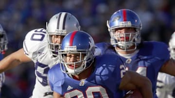 LAWRENCE, KS - NOVEMBER 18: Jon Cornish #29 of the Kansas Jayhawks carries the ball during the game against the Kansas State Wildcats at Memorial Stadium on November 18, 2006 in Lawrence, Kansas. The Kansas Jayhawks won 39-20. (Photo by Brian Bahr/Getty Images)