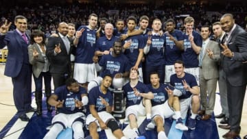 Mar 5, 2016; Villanova, PA, USA; The Villanova Wildcats pose for a photo with their Big East regular season championship trophy after defeating the Georgetown Hoyas 84-71 at Wells Fargo Center. Mandatory Credit: Bill Streicher-USA TODAY Sports