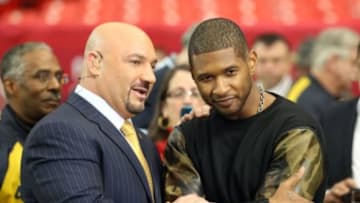 Jan 20, 2013; Atlanta, GA, USA; NFL sideline reporter Jay Glazer talks to recording artist Usher (right) prior to the NFC Championship game between the Atlanta Falcons and the San Francisco 49erst the Georgia Dome. Mandatory Credit: Matthew Emmons-USA TODAY Sports