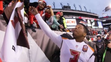 Tampa Bay Buccaneers quarterback Jameis Winston (3) signs autographs as he walks off the field after a victory against the Philadelphia Eagles at Lincoln Financial Field. The Buccaneers won 45-17. Mandatory Credit: Bill Streicher-USA TODAY Sports