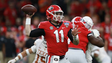 NEW ORLEANS, LOUISIANA - JANUARY 01: Jake Fromm #11 of the Georgia Bulldogs drops bak to pass against the Texas Longhorns during the first half of the Allstate Sugar Bowl at the Mercedes-Benz Superdome on January 01, 2019 in New Orleans, Louisiana. (Photo by Sean Gardner/Getty Images)