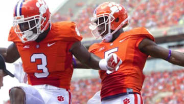 Sep 6, 2014; Clemson, SC, USA; Clemson Tigers wide receiver Artavis Scott (3) celebrates with wide receiver Germone Hopper (5) after scoring a touchdown during the first half against the South Carolina State Bulldogs at Clemson Memorial Stadium. Mandatory Credit: Joshua S. Kelly-USA TODAY Sports